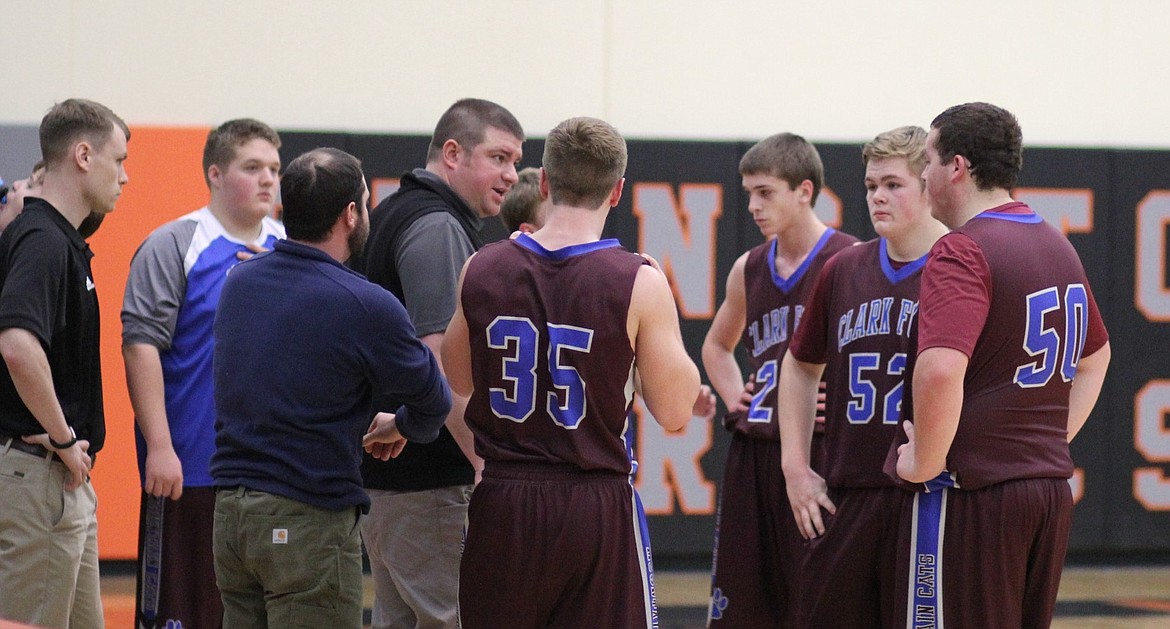 Head Coach, Erik Johnson, talks to his team during play at the Tip-Off Tournament in Frenchtown last Friday and Saturday. &#147;The majority of them are not learning how to be good; they are learning that they are good,&#148; Johnson said about his team.  (Kathleen Woodford/Mineral Independent).