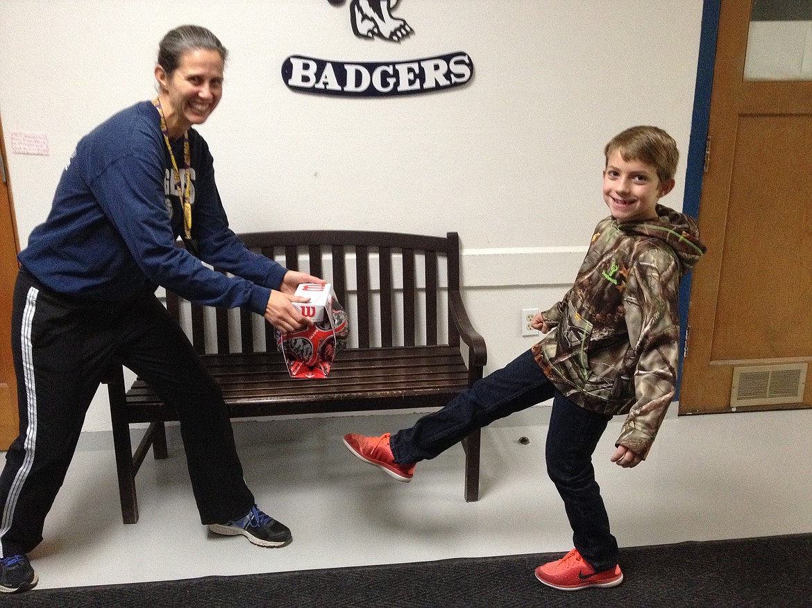 Stryder Lierman won a new soccer ball during the Family Fitness Challenge which encourages all families to exercise together.