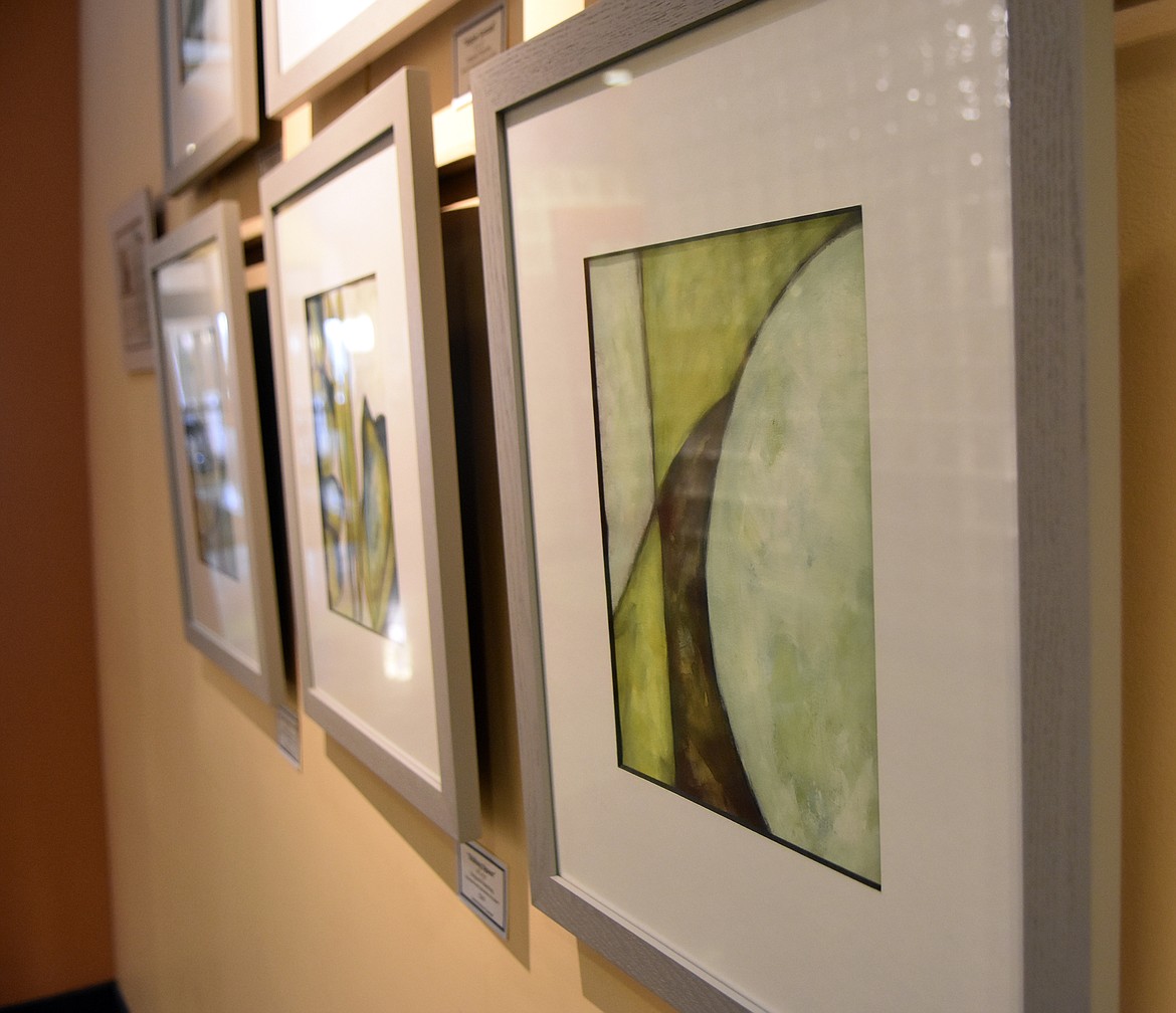 Artist Heidi Marie Faessel&#146;s work hangs in the main hallway at North Valley Hospital near the entrance to the hospital caf&eacute;. (Heidi Desch/Whitefish Pilot)