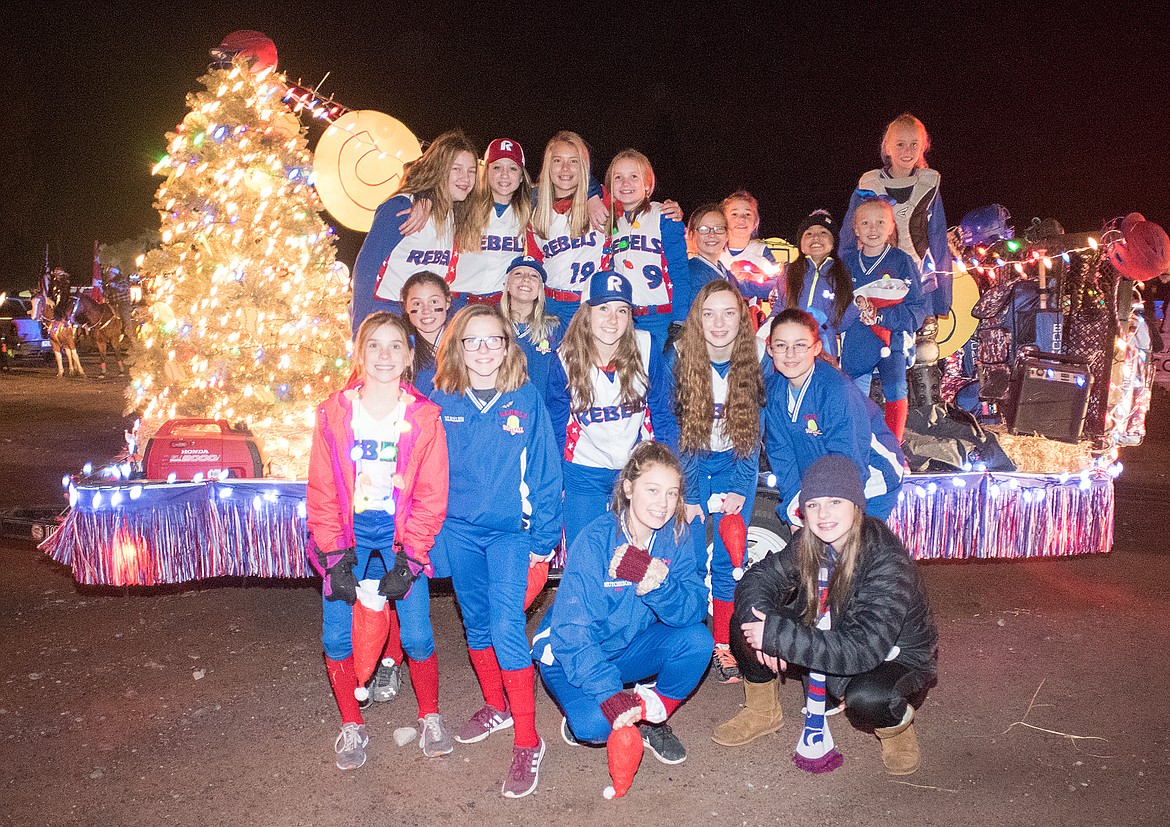 The Rebels softball team is ready for the parade.