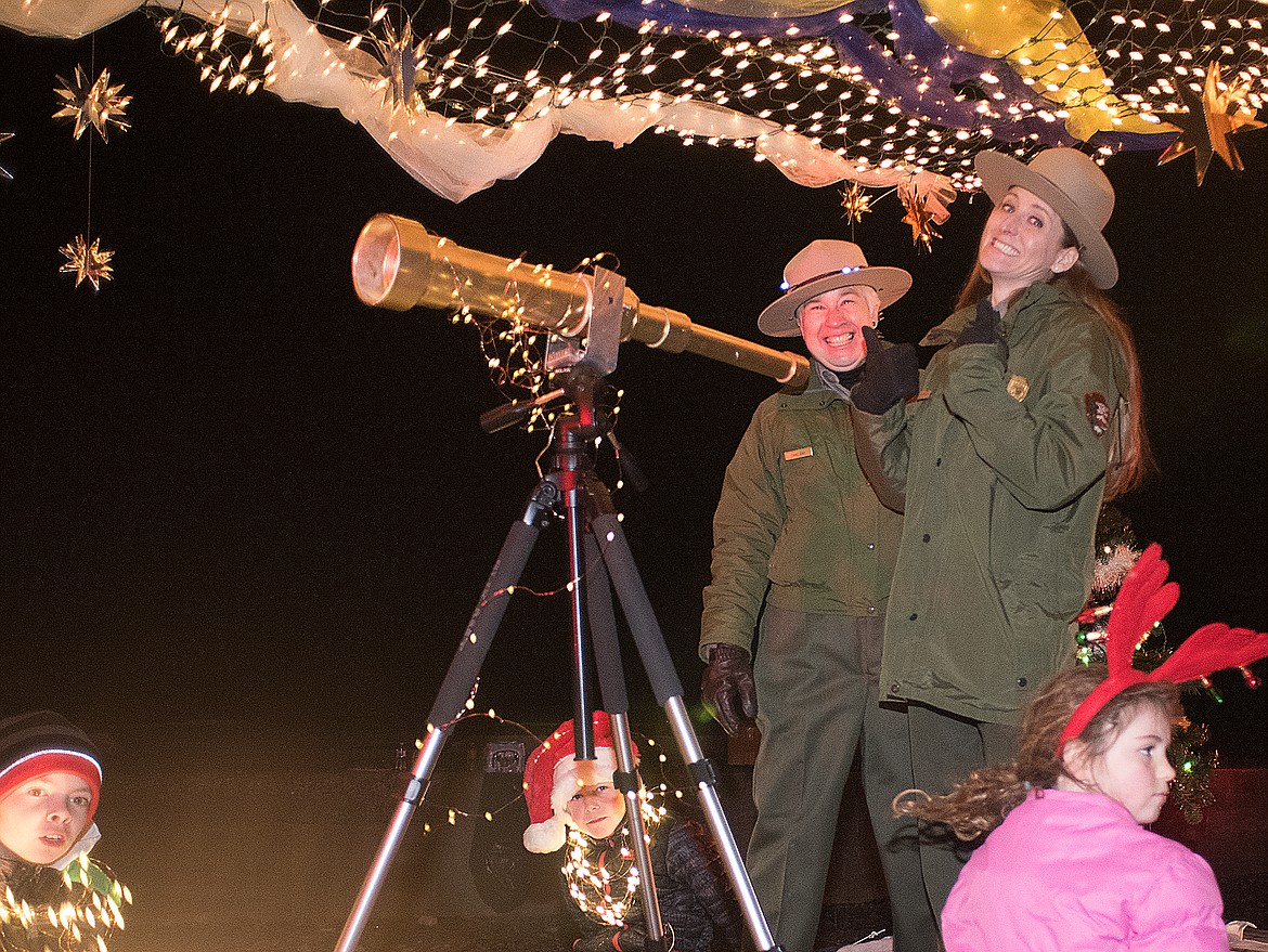 Claudette Byrd-Rinck and Diane Sine on the Glacier National Park float.