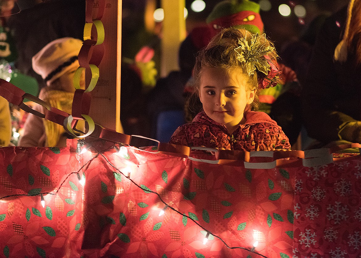 A youngster rides on the Head Start float.