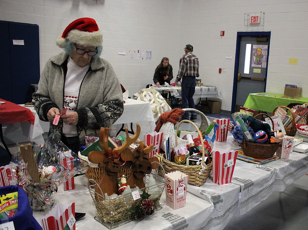 The Library sold raffle tickets for 25 gift baskets which were given away in the afternoon. (Kathleen Woodford/Mineral Independent).