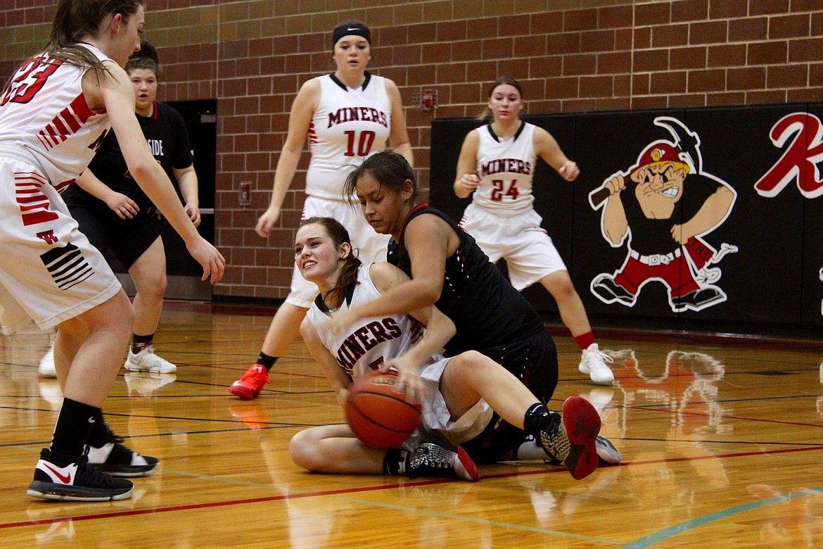 Kimmie Krous wrestles the ball away from a Lakeland player to give Wallace possession. Krous scored six points in the game, tying Maggie Howard for second most on the night.