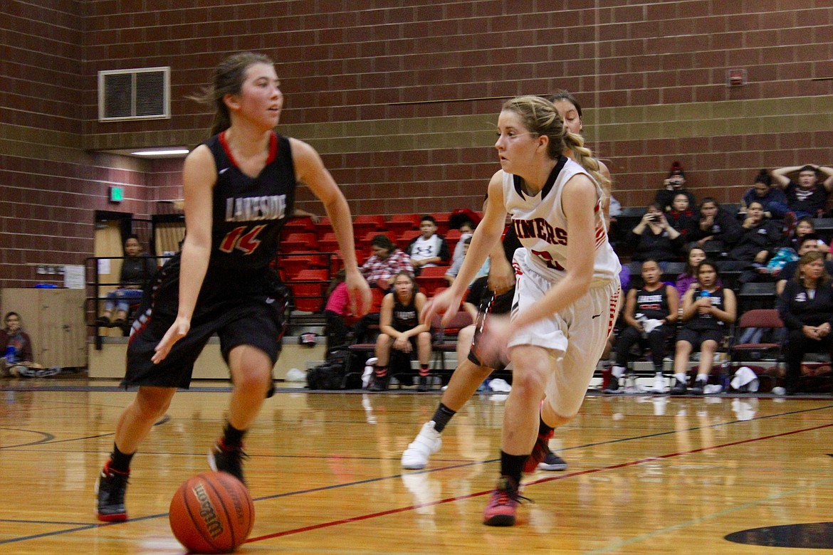Hayley Oertli put the pressure on a Lakeside player. Oertli led the Lady Miners in scoring with 11 points.