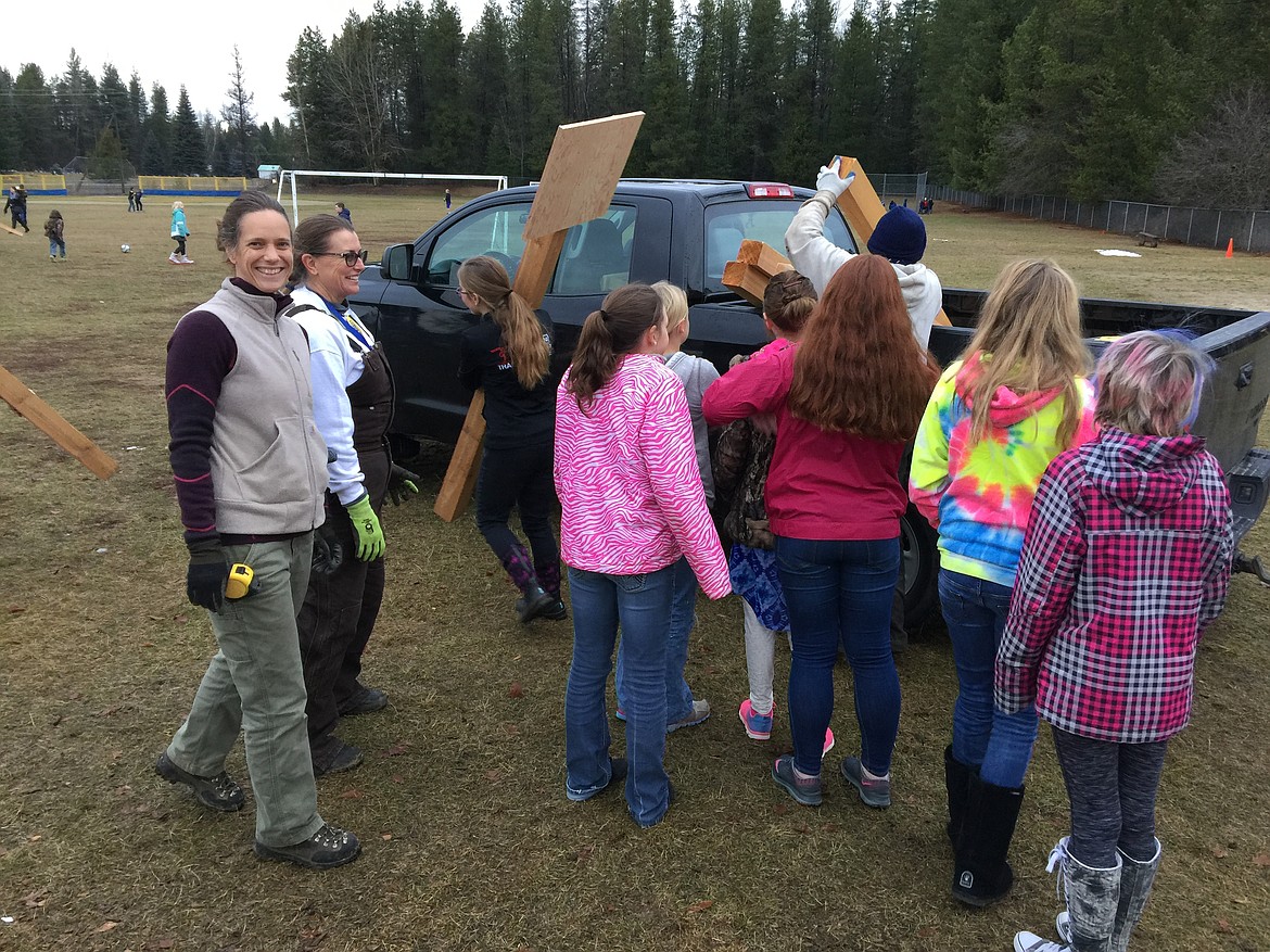 (Courtesy photo)
Northside Elementary students and volunteers gather as they prepare to install the new StoryWalk at the school.