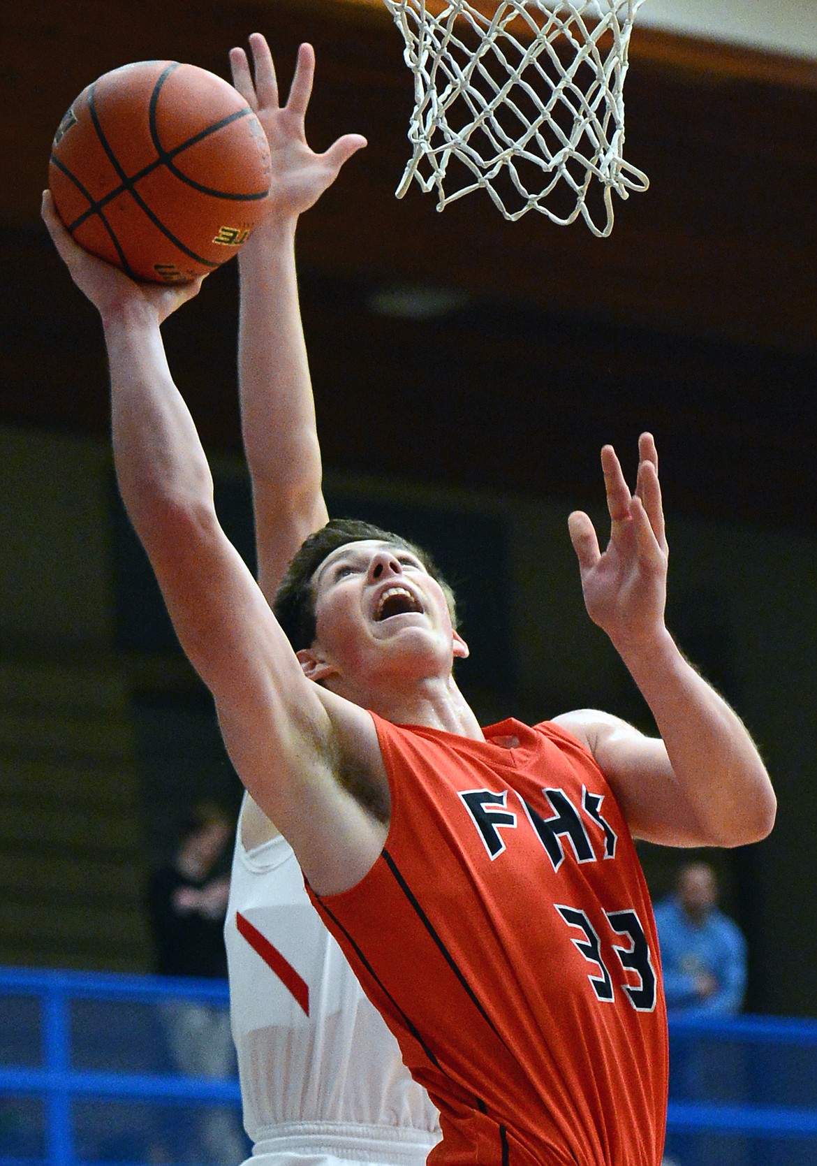 Flathead's Sam Elliot goes to the hoop during a 69-46 win over Columbia Falls on Saturday. (Casey Kreider/Daily Inter Lake)