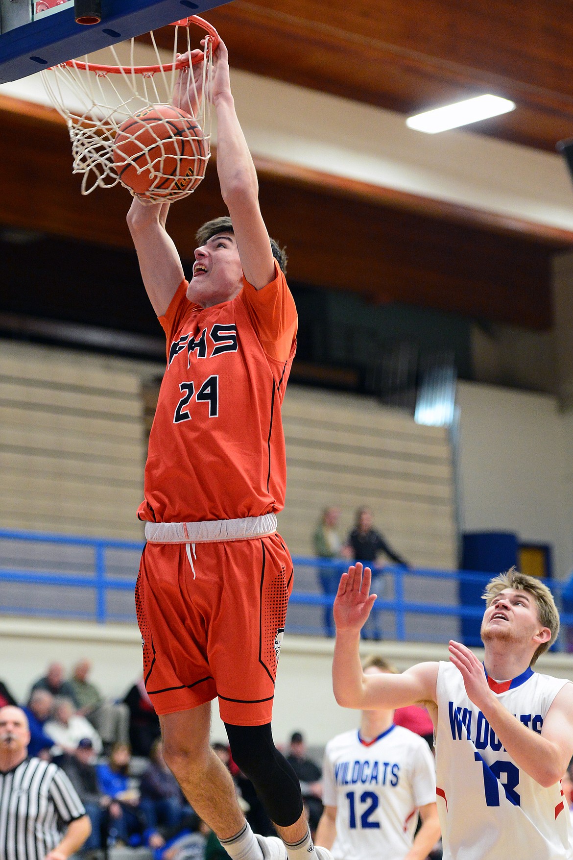 Flathead's Oz Allen dunks during a 69-46 win over Columbia Falls on Saturday. (Casey Kreider/Daily Inter Lake)