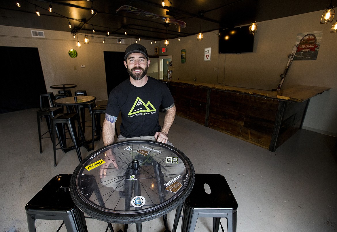 LOREN BENOIT/Press
Alex Castagno, who owns a downtown Coeur d&#146;Alene bicycle shop on Third Street with Chris Caro, poses for a portrait inside of The Post Ride, a new place where runners, hikers, climbers and skiers can sip a brew. Opening night is set for Friday.