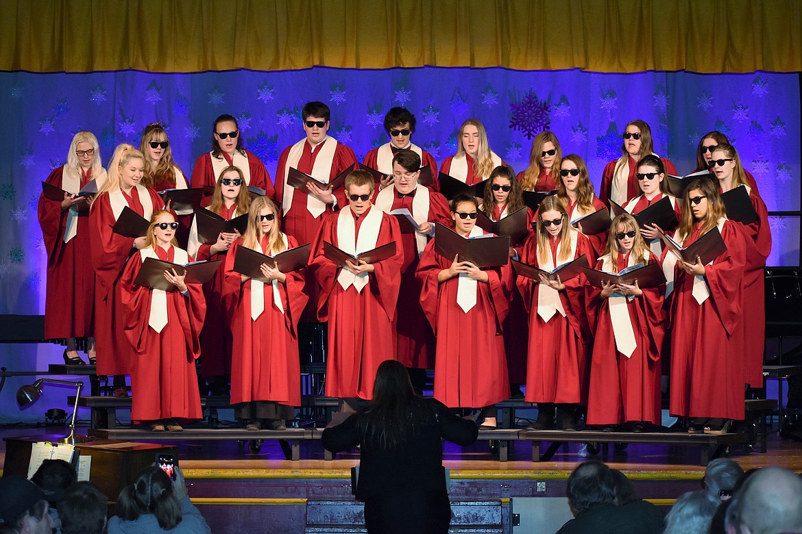 A choir sings &#147;Zat you, Santa Claus?&#148; at the Troy Junior High School and High School winter concert Dec. 14. (Photo by Svetlana Harper)