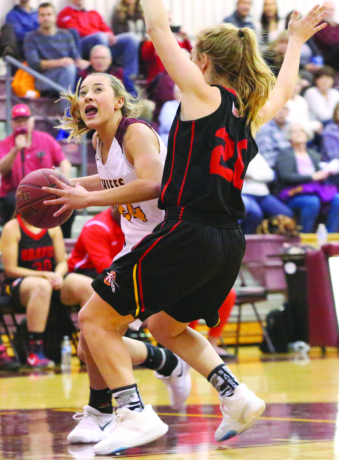 Connor Vanderweyst/Columbia Basin Herald
Moses Lake guard Madisyn Clark drives to the basket against Kamiakin's Rylie Clark.