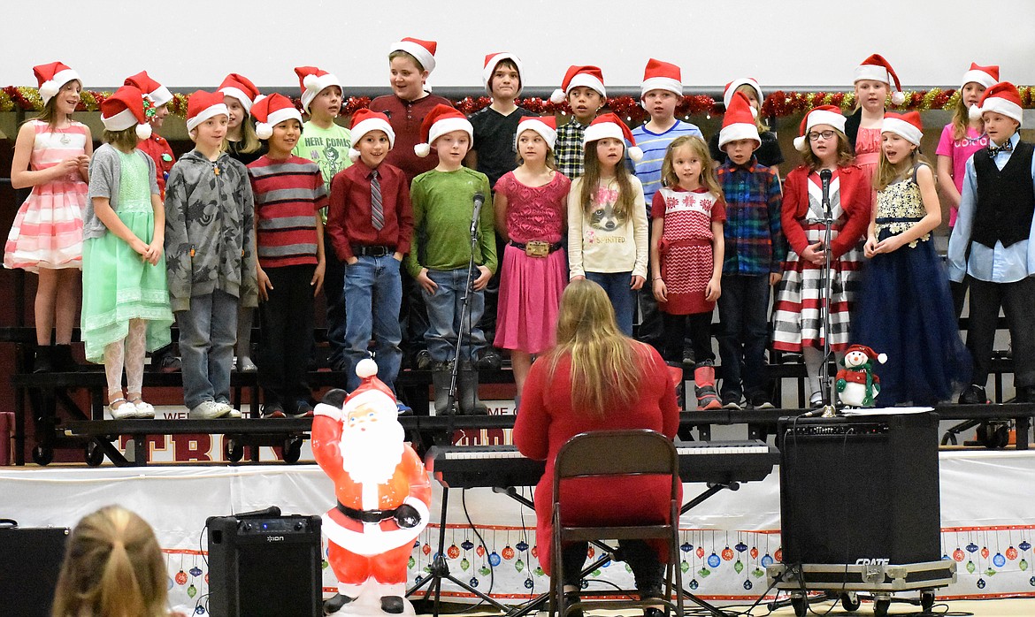 Troy Elementary School third-graders perform in the school’s Christmas concert Tuesday. (Photos by Svetlana Harper/Special to The Western News)