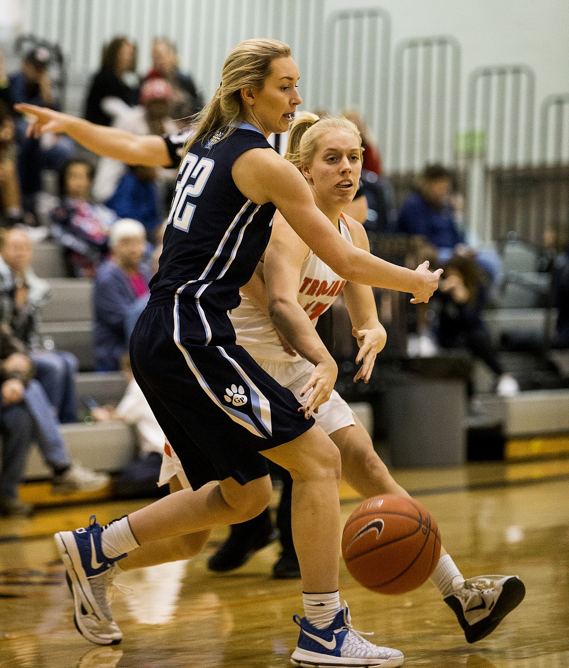 LOREN BENOIT/Press
Jenna Gardiner of Post Falls passes the ball around Gonzaga Prep defender Kerynica Keyes on Thursday night at Post Falls High School.