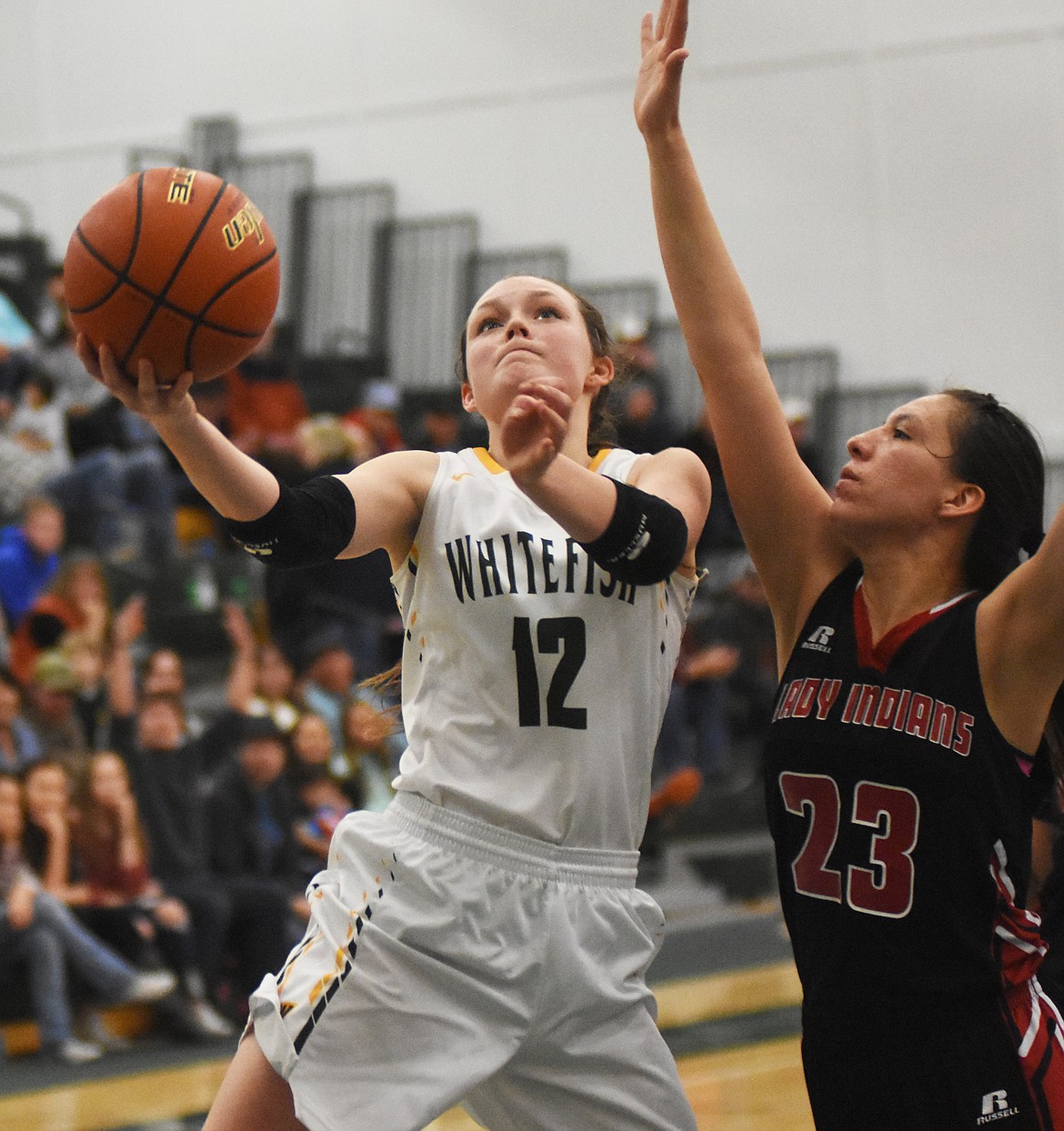 Kaiah Moore drives to the hoop against Browning on Saturday.