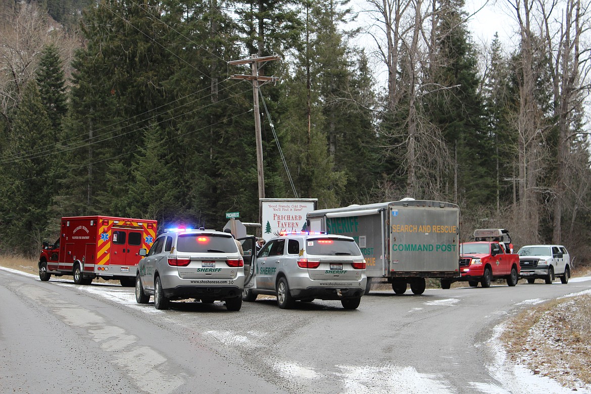 Photo by Chanse Watson/ 
The search and rescue base camp just down the road from the Prichard Tavern. The base camp was established not too far from the crash site. At the time of this photo, Gall is in the ambulance awaiting transport to SMC.