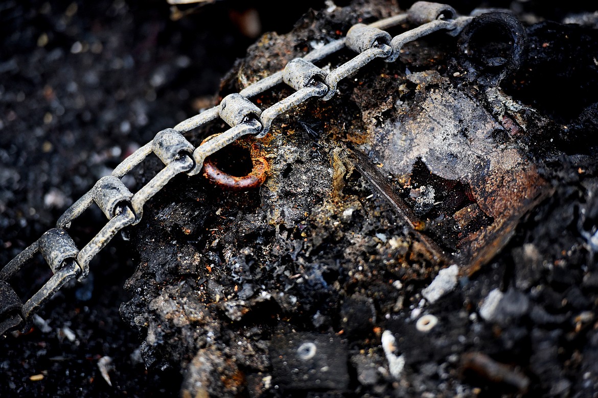 Details of the remains of a barn fire near Echo Lake that resulted in an estimated half a million dollars worth of loss.(Brenda Ahearn/Daily Inter Lake)