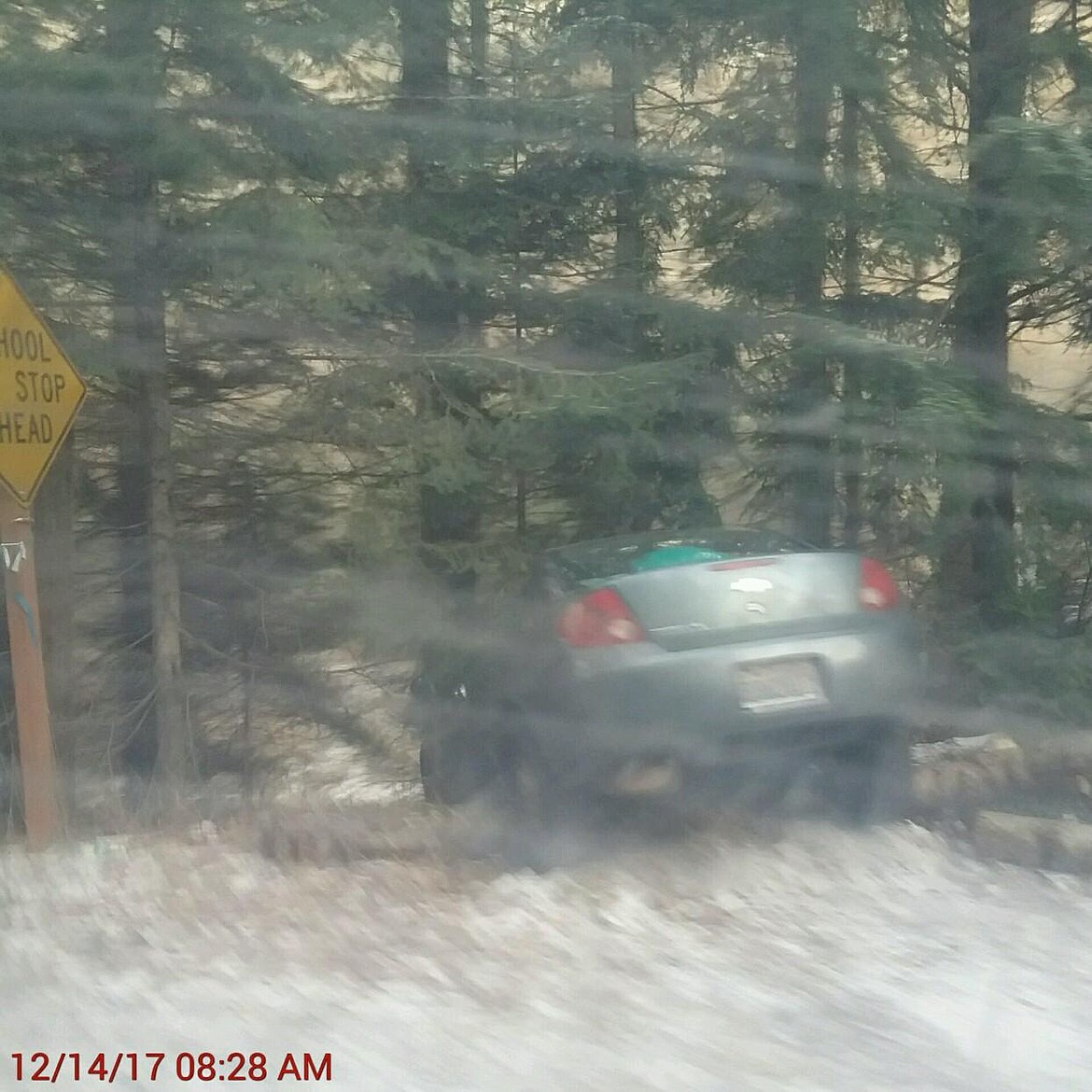 Courtesy photo/
The crashed vehicle that the three girls were in up Coeur d’Alene River Rd. The car reportedly hit a patch of ice, causing it to leave the roadway.