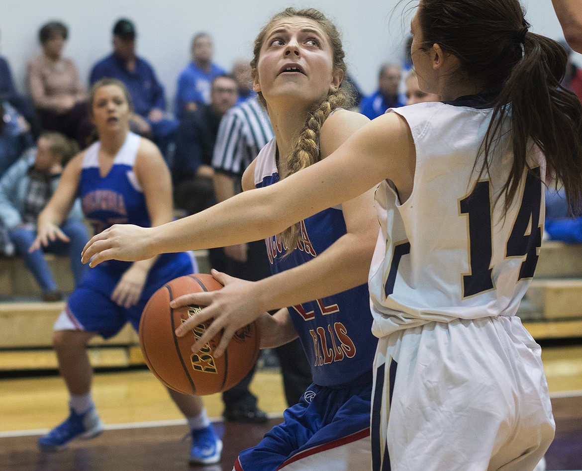 Hannah Schweikert takes the ball inside against Dillon. (Jeremy Weber photo)