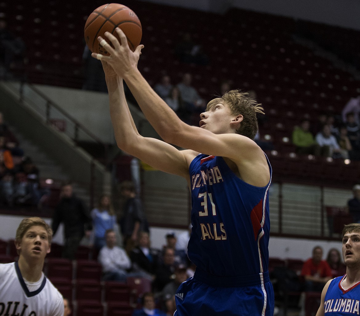 Matthew Morrison goes up for a shot in the first half againt Dillon. (Jeremy Weber photo)