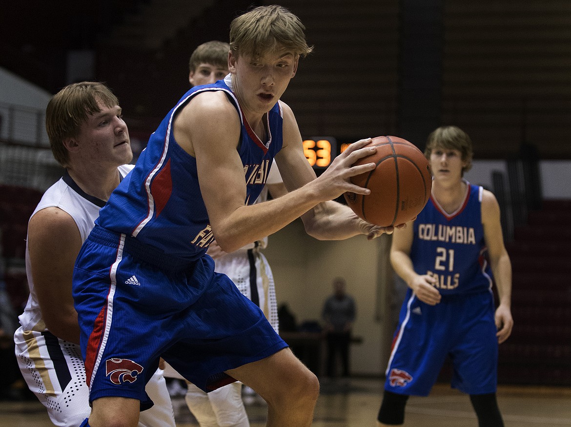 Matthew Morrison posts up against the Dillon defense. (Jeremy Weber photo)