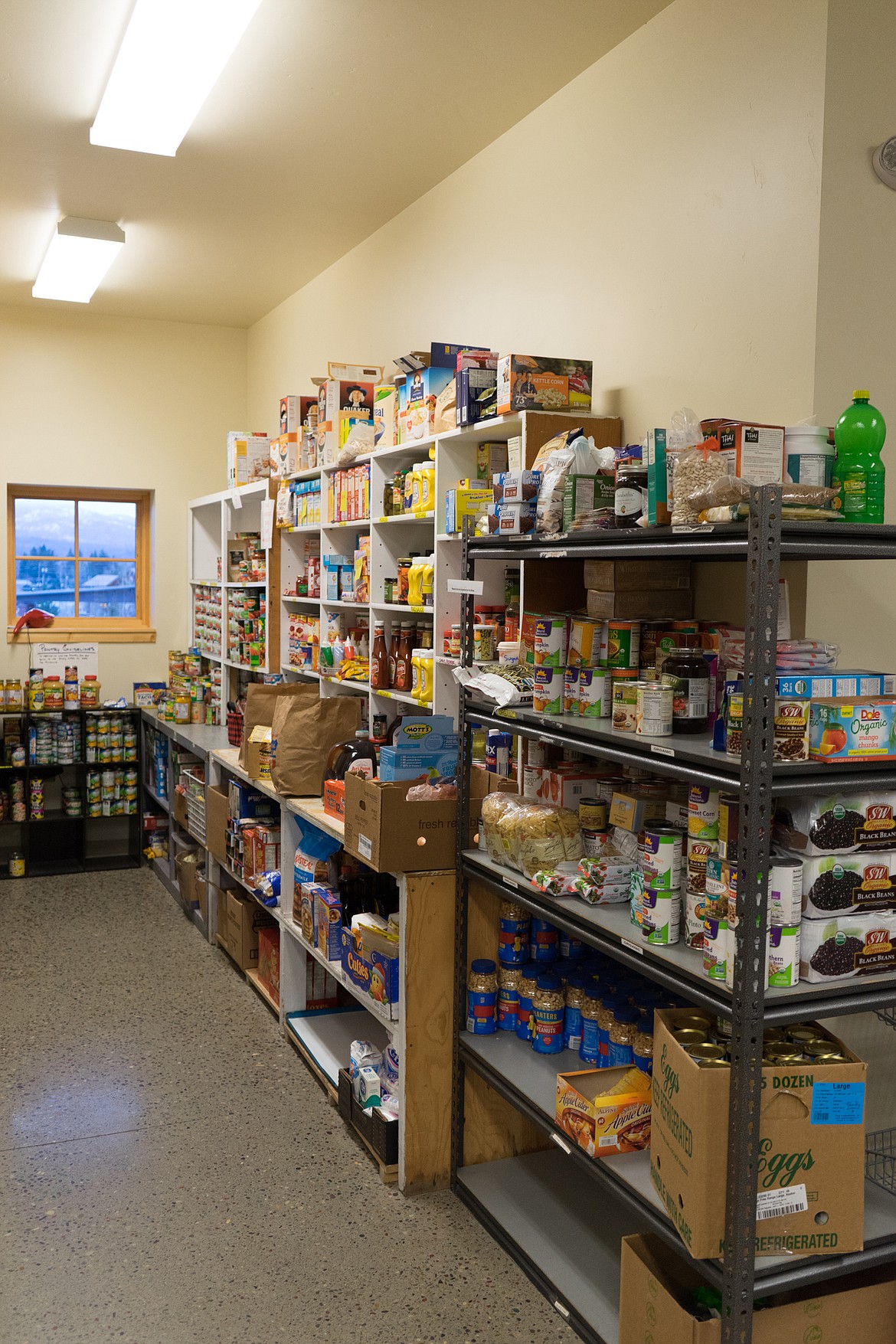 The shelves are stocked with food to give out at North Valley Food Bank.