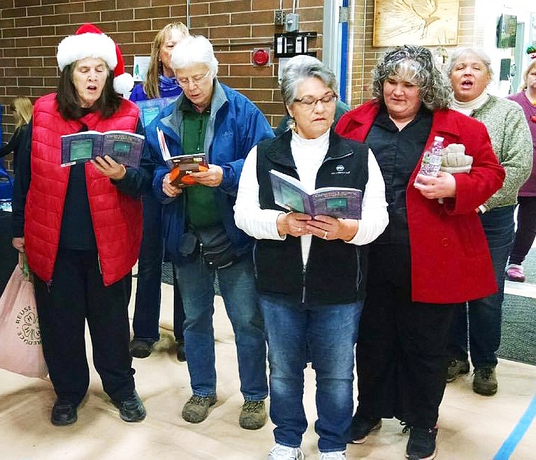 Carolers keep the spirit of Christmas vibrant at the Thompson Falls bazaar. (Clark Fork Valley Press)