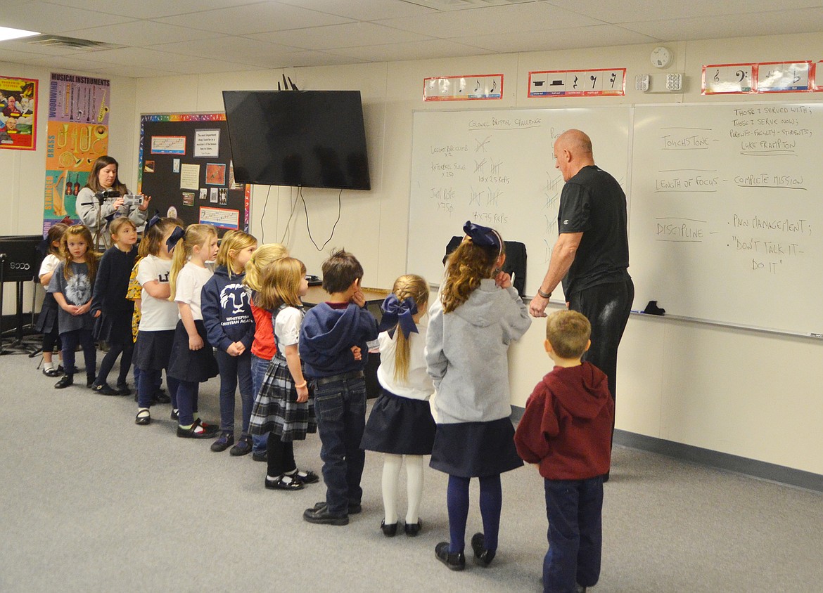 Bristol speaks with young Christian Academy students Thursday morning.