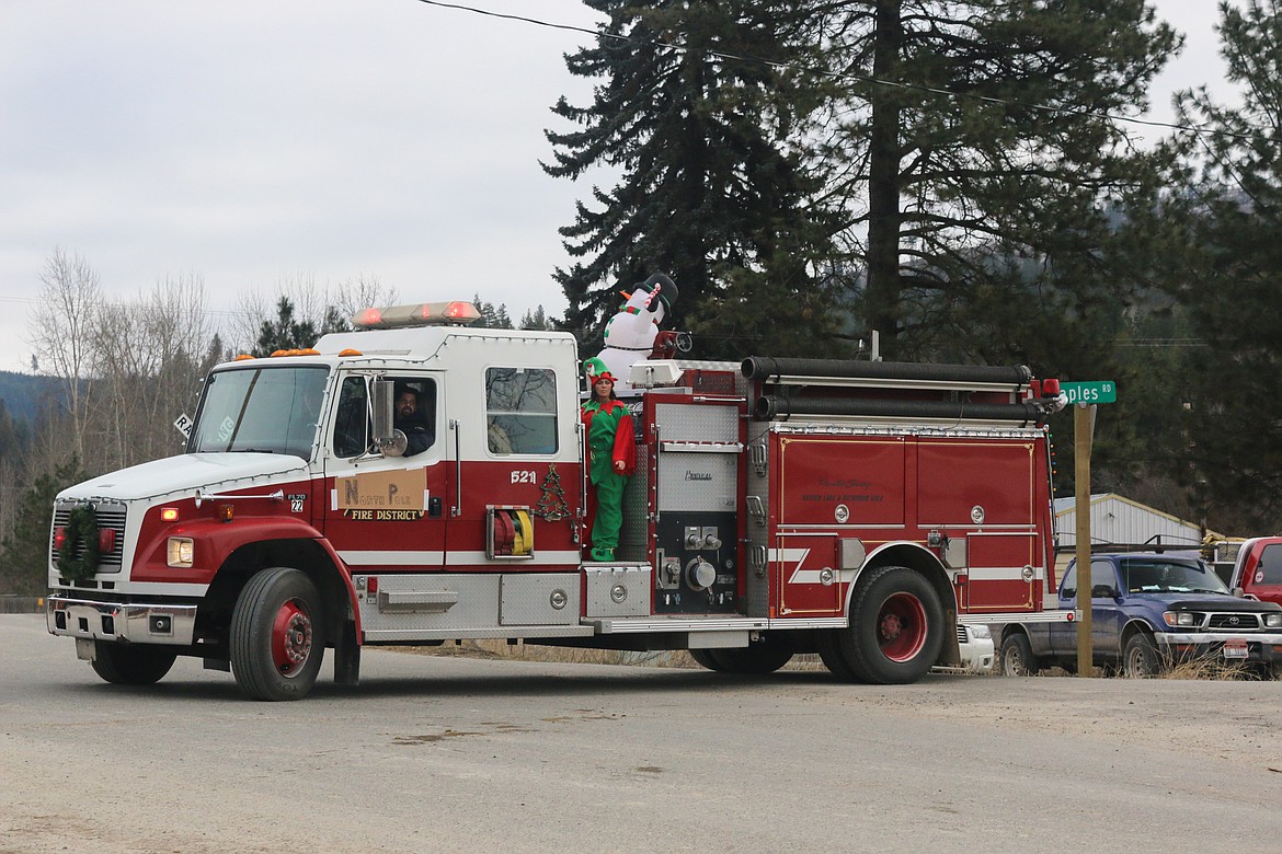 Photo by Mandi Bateman
South Boundary firetruck giving rides at the Naples Holiday Festival.