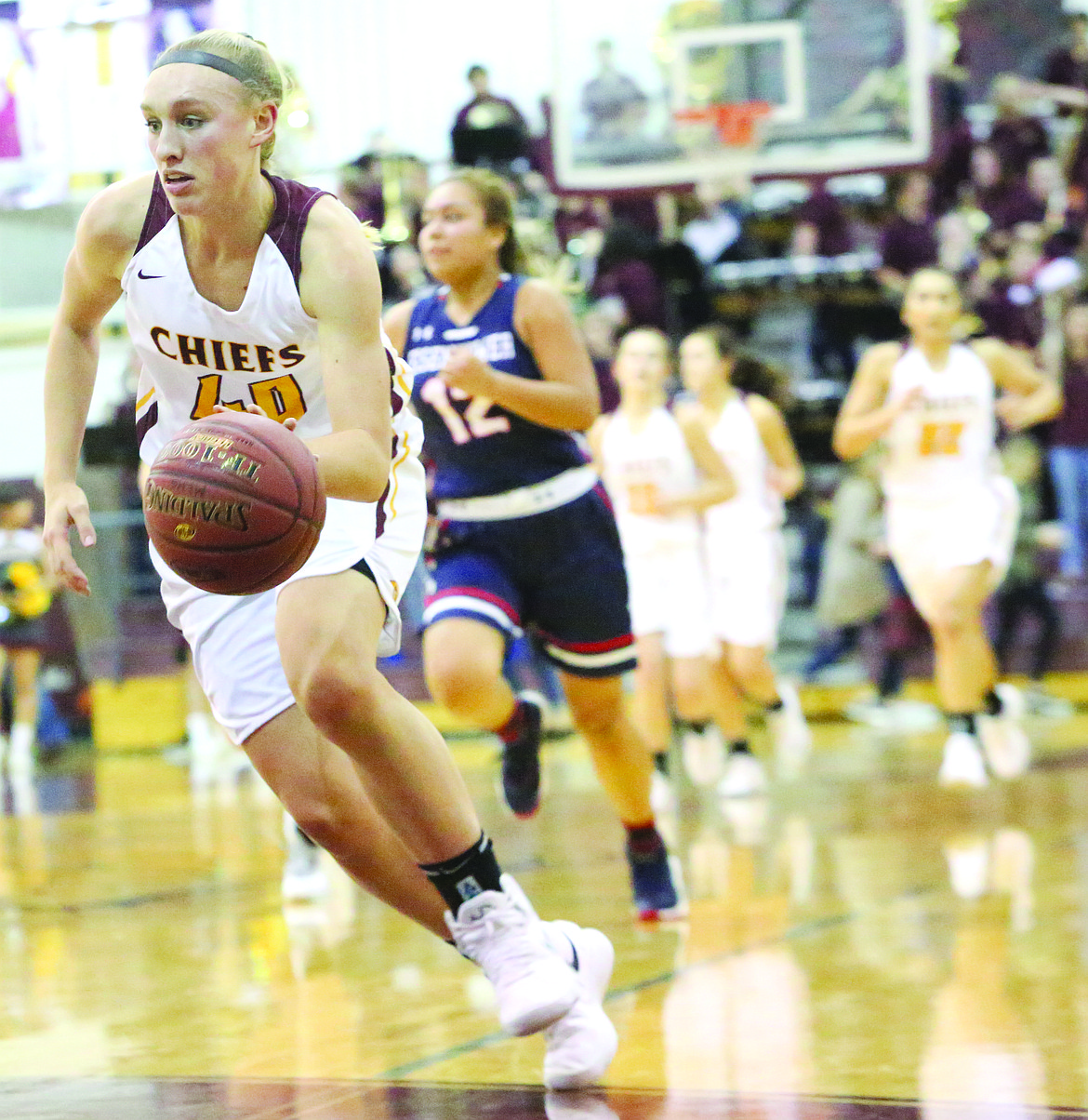 Connor Vanderweyst/Columbia Basin Herald
Moses Lake forward Abby Rathbun dribbles down the court on a breakaway.