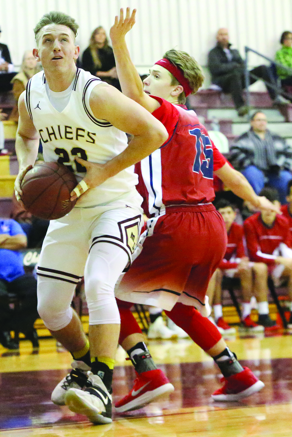 Connor Vanderweyst/Columbia Basin Herald
Moses Lake's Zach Phillips spins around Eisenhower defender John McDonald.