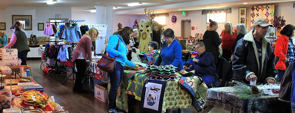 Holiday shoppers gathered at the St. Regis Community Center for the Annual St. Regis Community Council bazaar on Saturday, Dec. 2 for find unique and fun gifts. (Kathleen Woodford/Mineral Independent).