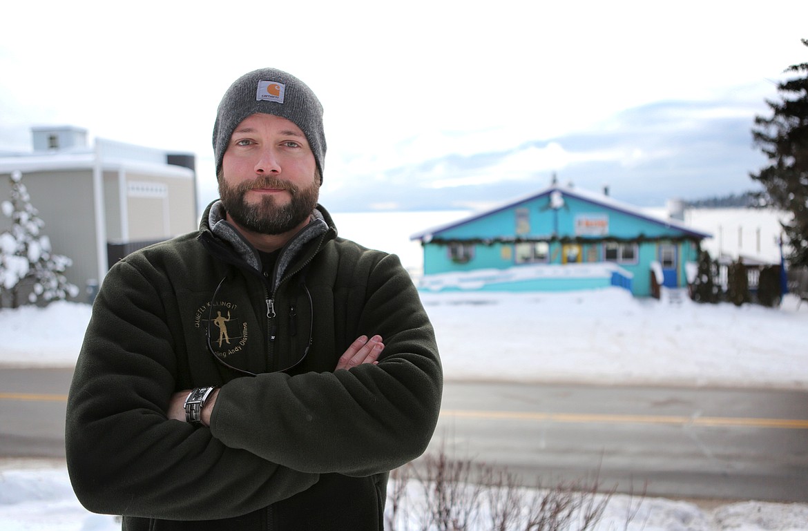 Dax VanFossen poses for a portrait in front of the Raven, where this weekend&#146;s 23rd annual Polar Bear Plunge will take place at 2 p.m., Dec. 31. (Mackenzie Reiss/Daily Inter Lake)