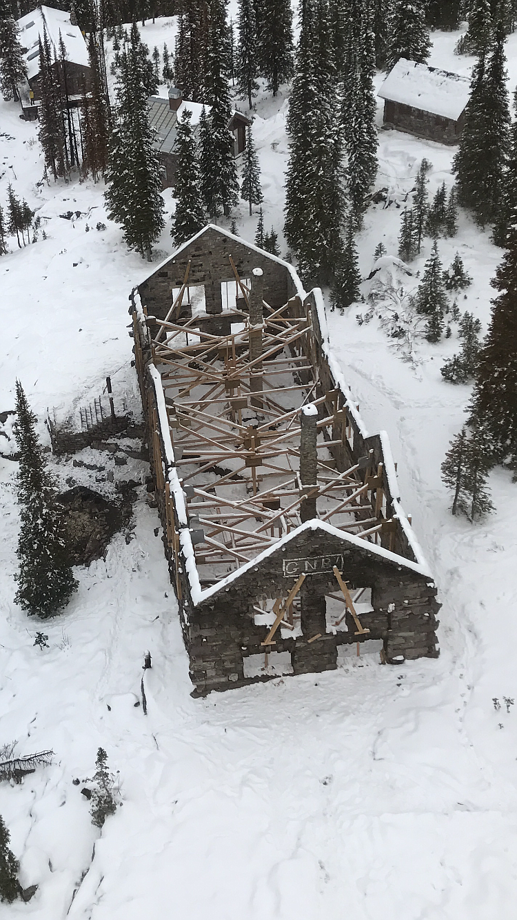 An aerial view shows the stabilization work at Sperry Chalet in Glacier National Park. The historic structure was gutted in the Sprague Fire this summer. (National Park Service photos)