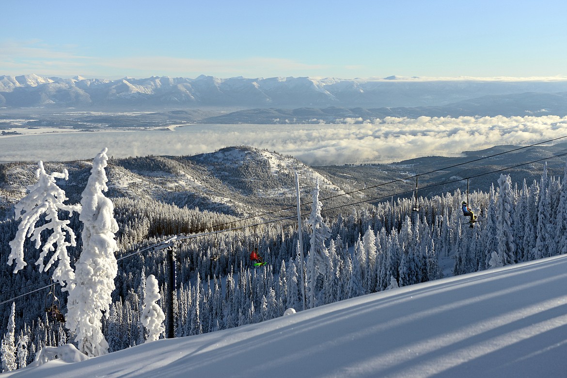 Guests ride the Thunderhead Double Chair lift at Blacktail Mountain Ski Area&#146;s opening day Saturday, Dec. 23. (Casey Kreider/Daily Inter Lake)