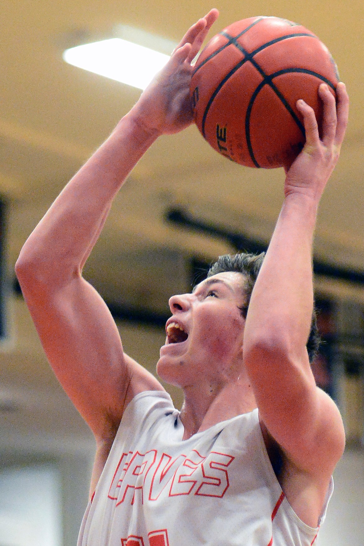 Flathead&#146;s Sam Elliott goes to the hoop in the first quarter against Butte. (Casey Kreider/Daily Inter Lake)