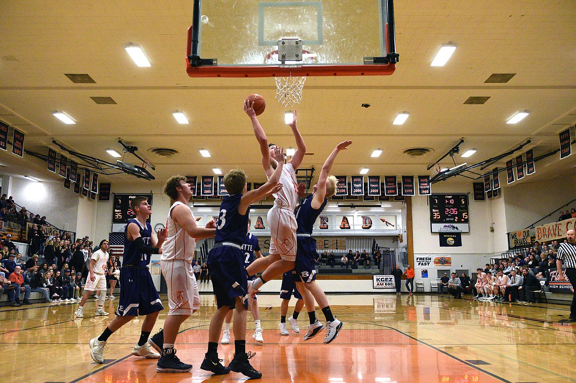 Flathead&#146;s Sam Elliott drives to the hoop against Butte. (Casey Kreider/Daily Inter Lake)