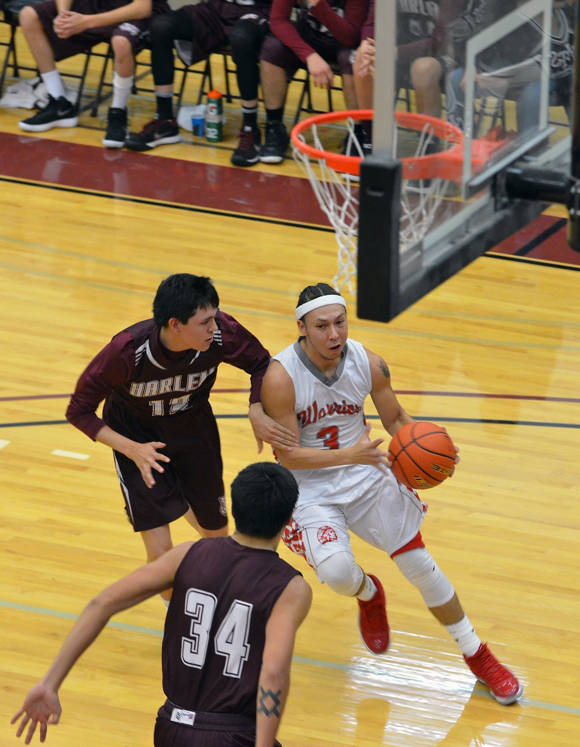 ARLEE GUARD Will Will Mesteth drives to the basket in the regular season opening tournament the Native American Classic at Salish Kootenai College. (Jason Blasco/Lake County Leader)