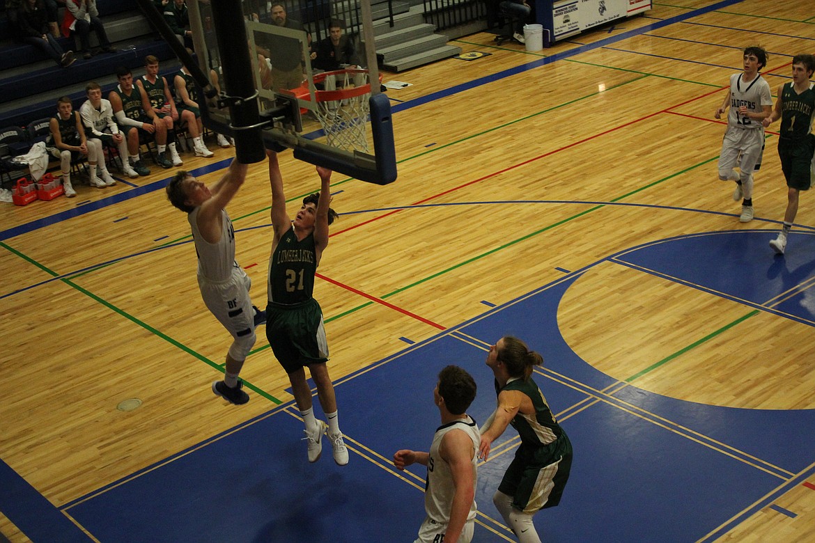 A St. Maries defender challenges a Badger shot in the two teams&#146; Dec. 21 contest.