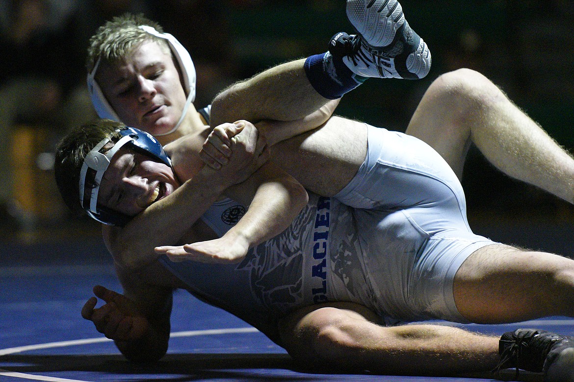 Glacier&#146;s Andrew Glynn wrestles Missoula Sentinel&#146;s Conall Powers at 152 lbs. Powers won by decision. (Casey Kreider/Daily Inter Lake)