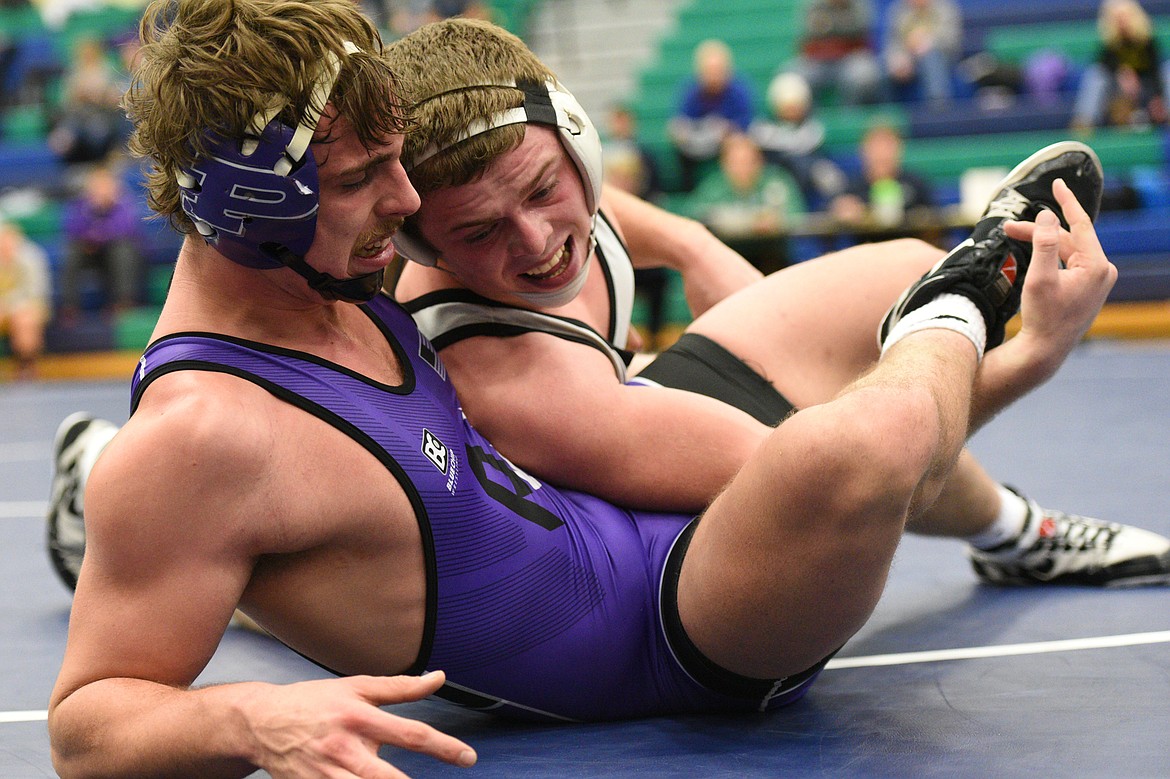 Polson&#146;s Noah Humphrey, left, wrestles Missoula Sentinel&#146;s Dylan Goforth at 182 lbs. Goforth won by pin. (Casey Kreider/Daily Inter Lake)