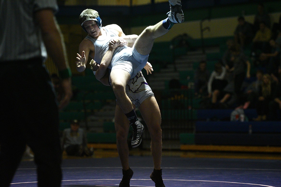 Glacier&#146;s Andrew Glynn is thrown by Missoula Sentinel&#146;s Conall Powers at 152 lbs. Powers won by decision. (Casey Kreider/Daily Inter Lake)