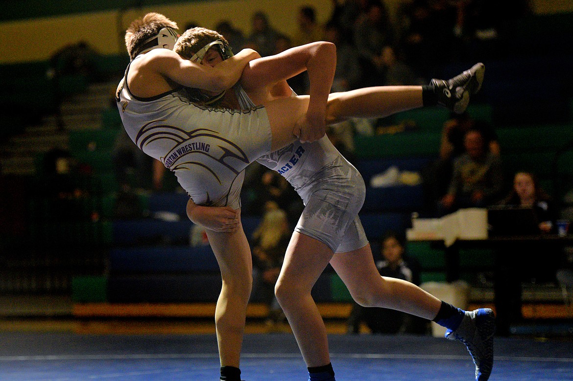 Glacier&#146;s Kael Willis, right, wrestles Missoula Sentinel&#146;s Novik Thomas at 113 lbs. Willis won by decision. (Casey Kreider/Daily Inter Lake)