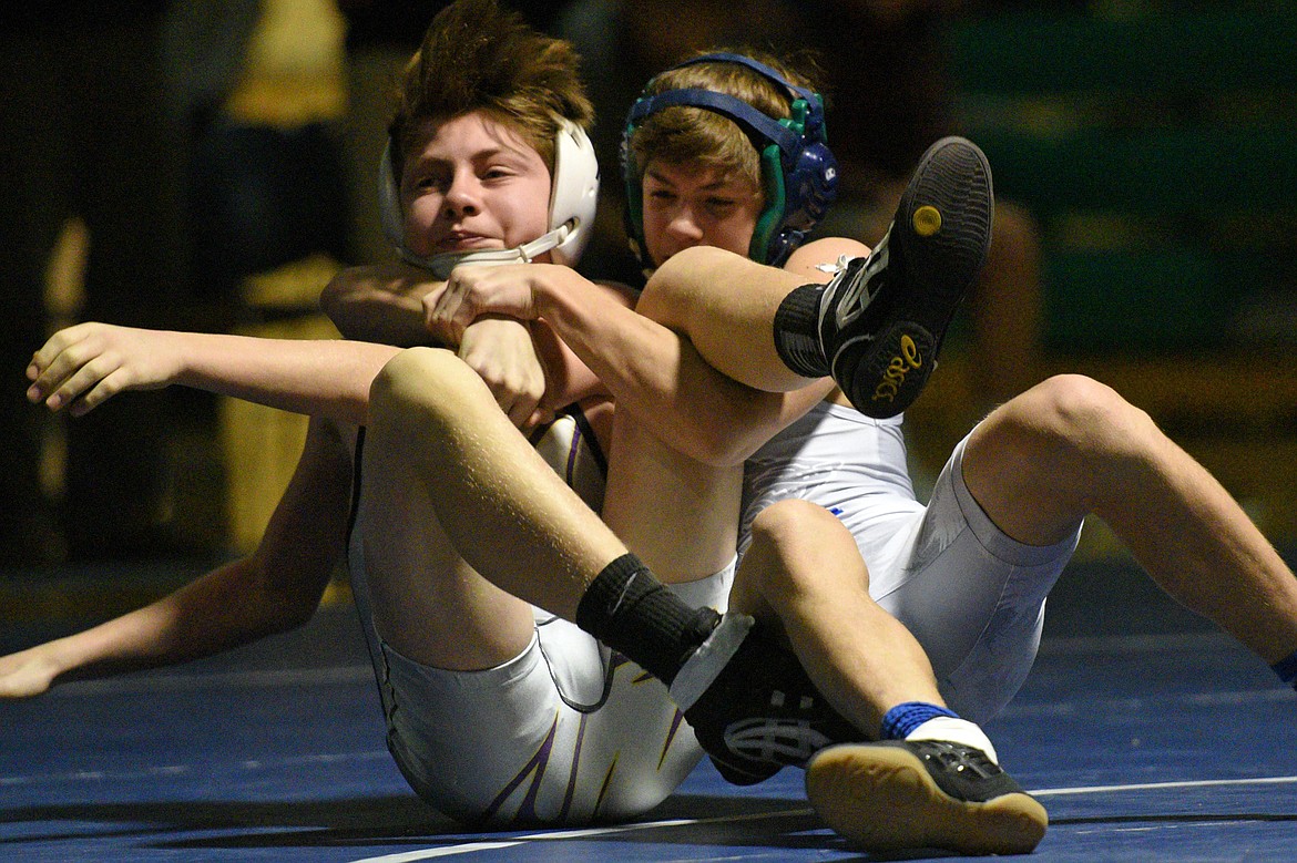 Glacier&#146;s Cody Frost, right, won by pin over Missoula Sentinel&#146;s Corbin Likerik at 103 lbs. (Casey Kreider/Daily Inter Lake)