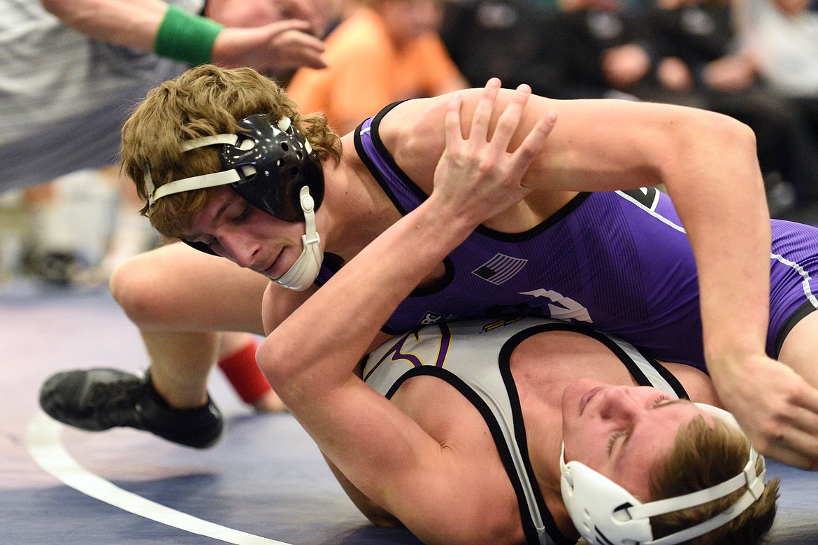 Polson&#146;s Parker Adler, top, works towards a pin of Missoula Sentinel&#146;s Conall Powers at 152 lbs. (Casey Kreider/Daily Inter Lake)