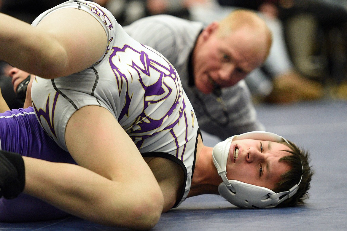 Missoula Sentinel&#146;s Novik Thomas is pinned by Polson&#146;s RJ Pierre at 113 lbs. (Casey Kreider/Daily Inter Lake)