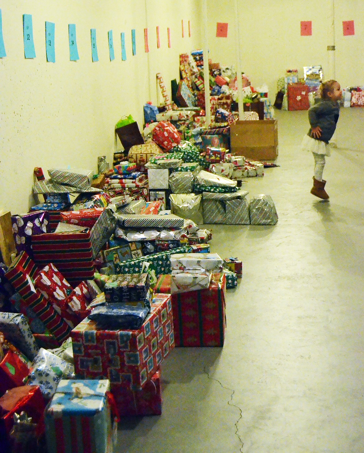 Presesnts lined the walls for each age group waiting for a special present this Christmas (Erin Jusseaume/ Clark Fork Valley Press)