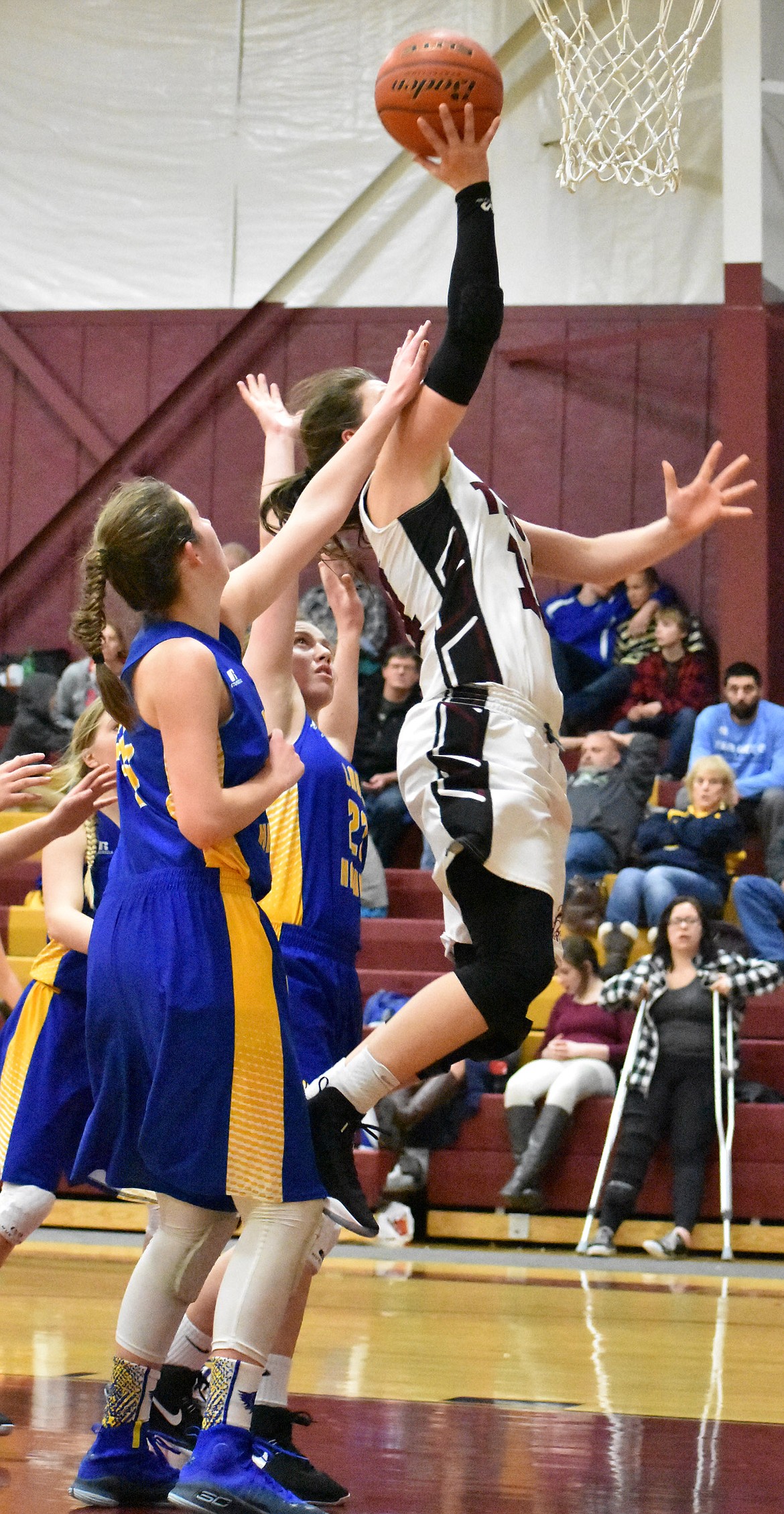 Troy's Allie Coldwell scores against Thompson Falls on Thursday. (Photo by Svetlana Harper)