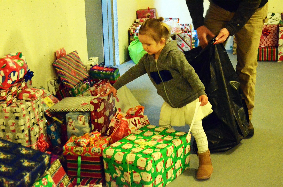 LIttle Lena Oldenburg was the youngest &#146;Elf&#146; helping pack presents for the Sheriff&#146;s Relief Fund (Erin Jusseaume/ Clark Fork Valley Press)
