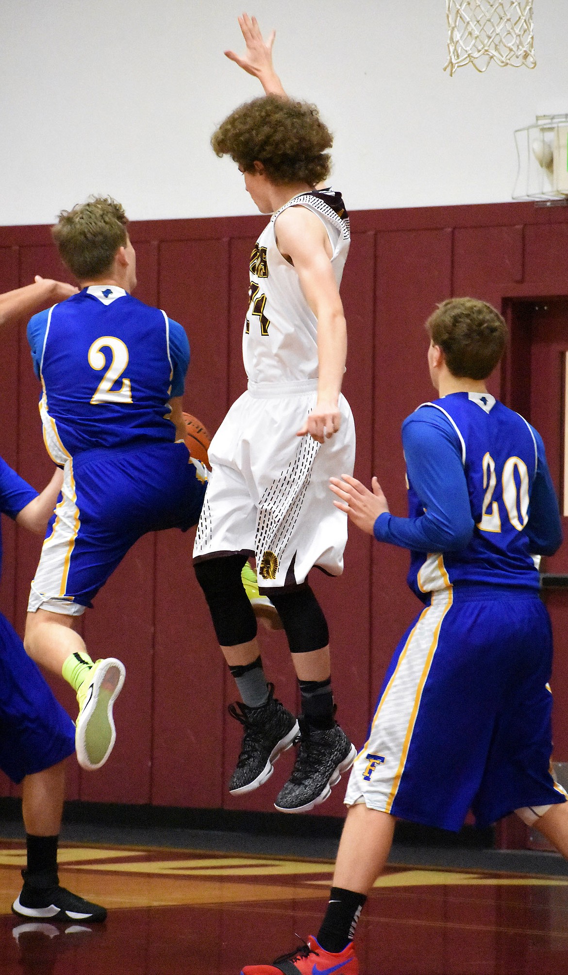 Troy's Hunter Leighty defends against Ryan Schraeder of Thompson Falls on Thursday. (Photo by Svetlana Harper)