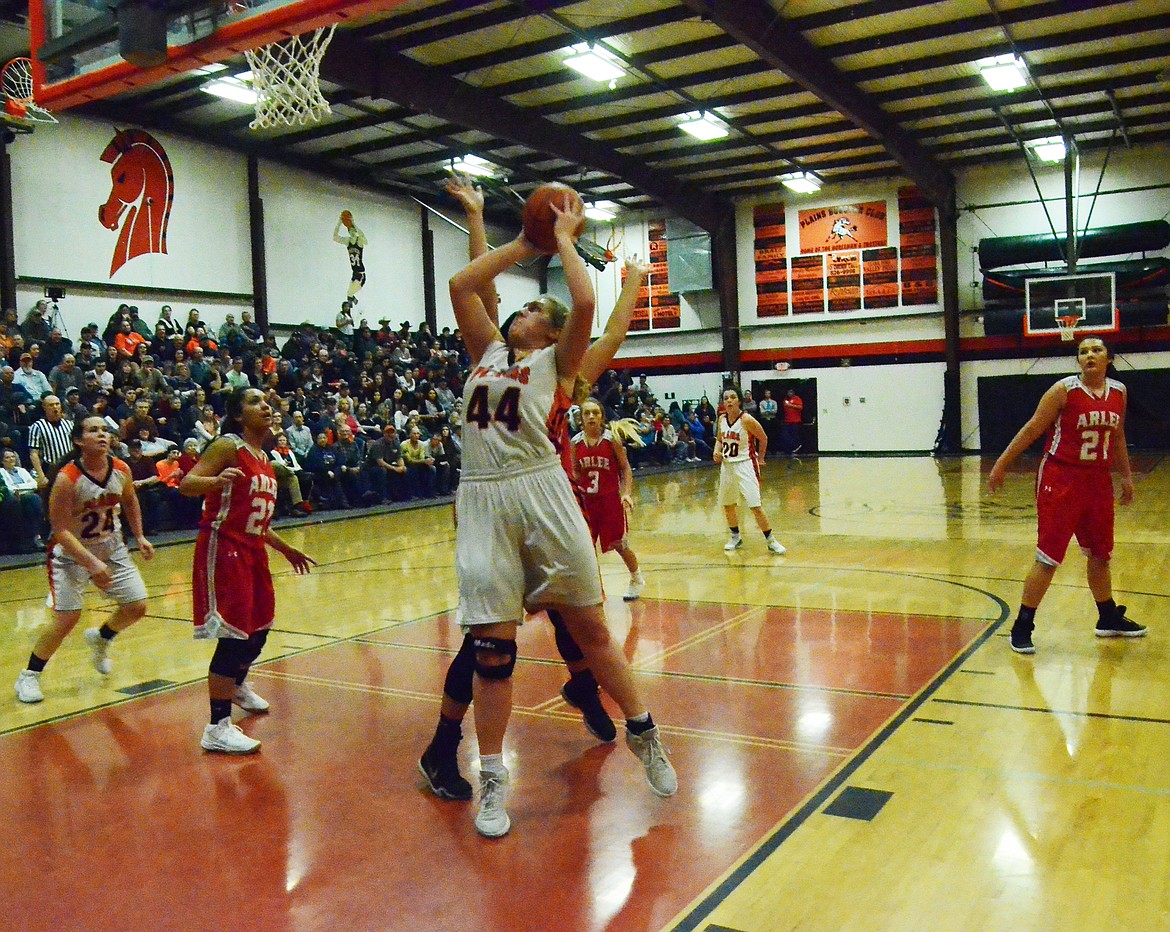 Jessica Thompson (44) makes a successful lay-up for the Trotters (Erin Jusseaume/ Clark Fork Valley Press)